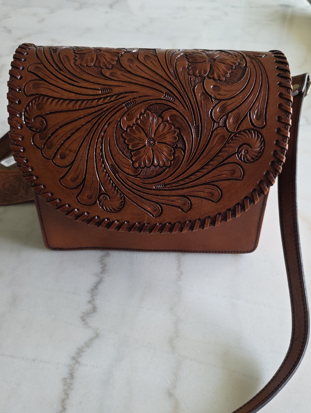 Hand-Tooled Brown Leather Crossbody Bag with Floral Motif